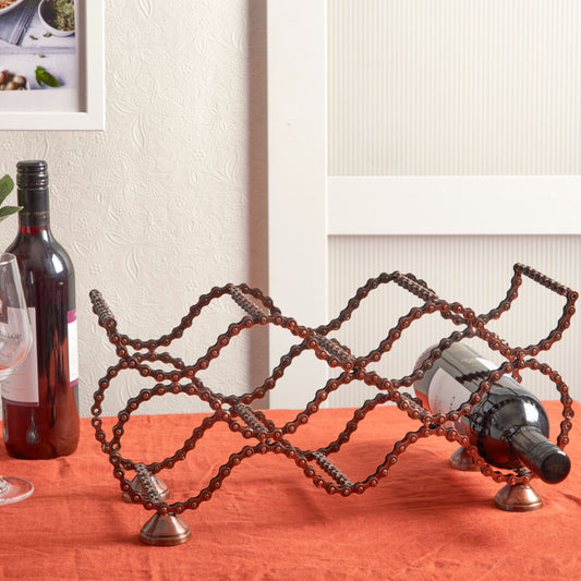 Revamp Your Wine Storage in Style: Discover the Beauty of an Up-cycled Bicycle Chain Wine Bottle Rack